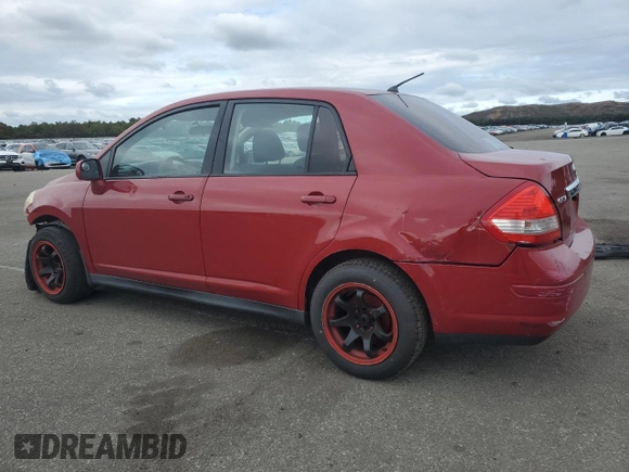 2010 Nissan Versa 1.8 S with VIN 3N1BC1AP4AL371722, listed as a Copart auction lot 72641144 with 128,445 mi miles and Salvage Title. Bid and sale history available at carsss.com. Image 2.