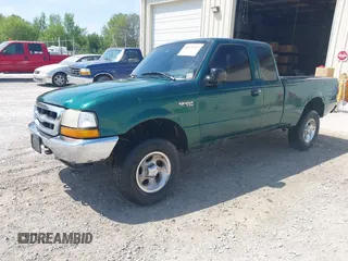 1999 Ford Ranger XLT with VIN 1FTZR15X7XPA71738, listed as a IAAI auction lot 42071163 with 225,035 mi miles and . Bid and sale history available at DreamBid. Image 2.