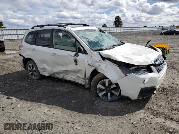 2017 Subaru Forester Premium with VIN JF2SJAEC1HH444310, listed as a Copart auction lot 52198125 with 107,041 mi miles and Salvage Title. Bid and sale history available at DreamBid. Image 4.