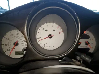 2001 Toyota MR2 z VIN JTDFR320010037968, wystawiony jako Copart lot #81606354 z przebiegiem 127 690 mil mil oraz Szkoda całkowita • Salvage title. Historia ofert i sprzedaży dostępna na DreamBid. Obrazek 9.