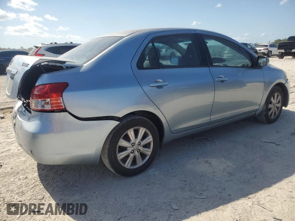 2009 Toyota Yaris with VIN JTDBT903591302633, listed as a Copart auction lot 53512185 with 351,622 mi miles and Salvage Title. Bid and sale history available at carsss.com. Image 3.