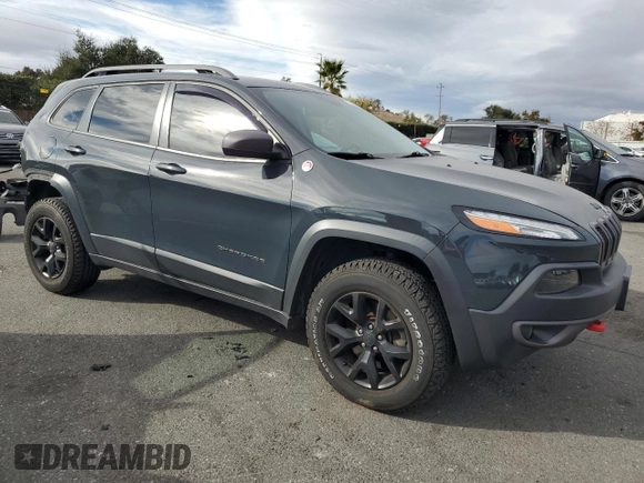 2017 Jeep Cherokee Trailhawk L Plus with VIN 1C4PJMBB1HW538426, listed as a Copart auction lot 81583654 with 120,602 mi miles and Salvage Title. Bid and sale history available at carsss.com. Image 4.