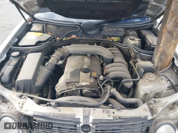 1997 Mercedes-Benz E-Class with VIN WDBJF55FXVJ033553, listed as a IAAI auction lot 41425117 with 280,019 mi miles. Bid and sale history available at carsss.com. Image 10.