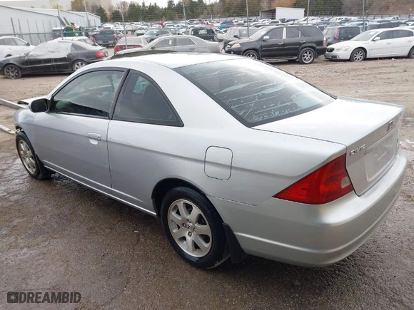 2003 Honda Civic EX with VIN 1HGEM229X3L040978, listed as a IAAI auction lot 40938878 with 250,124 mi miles. Bid and sale history available at carsss.com. Image 3.