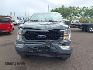 2021 Ford F-150 XL with VIN 1FTEW1EP0MFB94936, listed as a IAAI auction lot 41594393 with 57,033 mi miles. Bid and sale history available at carsss.com. Image 12.