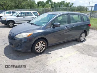 2012 Mazda 5 Sport with VIN JM1CW2BL8C0131745, listed as a IAAI auction lot 42625411 with 194,875 mi miles and . Bid and sale history available at DreamBid. Image 2.