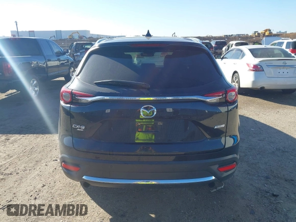 2018 Mazda CX-9 Signature with VIN JM3TCBEY2J0207786, listed as a IAAI auction lot 41478330 with 99,311 mi miles and . Bid and sale history available at DreamBid. Image 16.