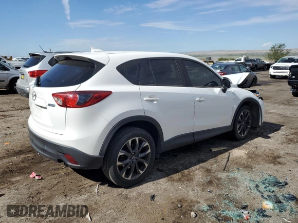 2016 Mazda CX-5 Grand Touring with VIN JM3KE2DY0G0888854, listed as a Copart auction lot 68379754 with 73,096 mi miles and Salvage Title. Bid and sale history available at carsss.com. Image 3.