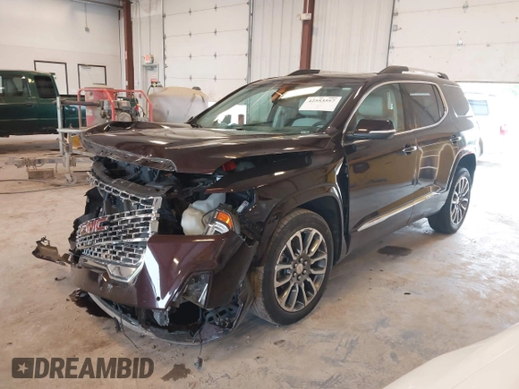 2021 GMC Acadia Denali with VIN 1GKKNXLS2MZ140119, listed as a IAAI auction lot 42553557 with 50,197 mi miles and . Bid and sale history available at DreamBid. Image 17.