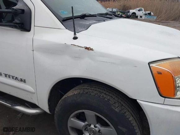 2007 Nissan Titan LE with VIN 1N6BA07B87N246012, listed as a IAAI auction lot 41561124 with 344,652 mi miles. Bid and sale history available at carsss.com. Image 6.