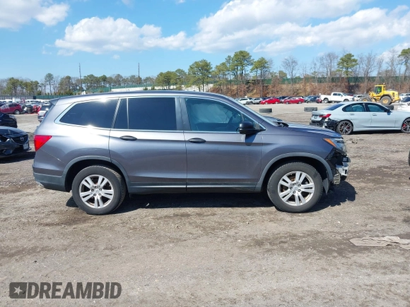 2016 Honda Pilot LX with VIN 5FNYF6H14GB082537, listed as a IAAI auction lot 41864525 with 137,097 mi miles. Bid and sale history available at carsss.com. Image 14.