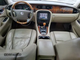 2008 Jaguar XJ with VIN SAJWA79B48SH21186, listed as a Copart auction lot 43704975 with 197,944 mi miles and Salvage Title. Bid and sale history available at carsss.com. Image 8.