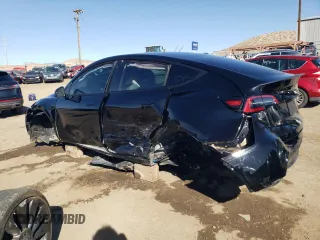 2023 Tesla Model Y Performance with VIN 7SAYGDEF3PF773031, listed as a Copart auction lot 47105765 with 25,604 mi miles and Salvage Title. Bid and sale history available at DreamBid. Image 2.