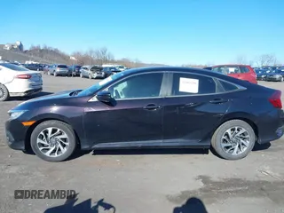 2017 Honda Civic EX with VIN 19XFC2F87HE076134, listed as a IAAI auction lot 41863290 with 61,583 mi miles and . Bid and sale history available at DreamBid. Image 14.