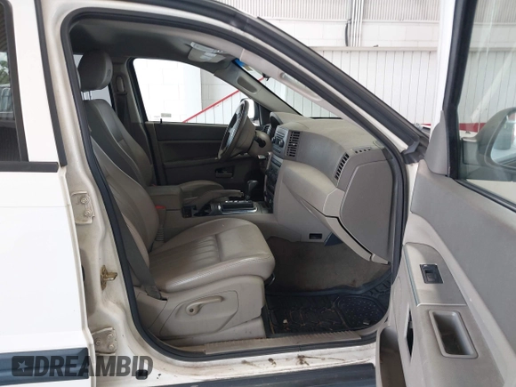 2005 Jeep Grand Cherokee Laredo with VIN 1J4GR48K25C599307, listed as a IAAI auction lot 42705166 with 231,747 mi miles and . Bid and sale history available at DreamBid. Image 5.