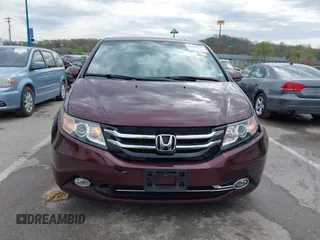 2014 Honda Odyssey Touring with VIN 5FNRL5H9XEB073156, listed as a IAAI auction lot 41990714 with 166,129 mi miles and . Bid and sale history available at DreamBid. Image 12.