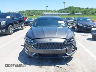 2020 Ford Fusion Titanium with VIN 3FA6P0K96LR173971, listed as a IAAI auction lot 42232469 with 82,474 mi miles and . Bid and sale history available at DreamBid. Image 13.