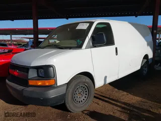 2014 Chevrolet Express Cargo Van with VIN 1GCSGAFX9E1135879, listed as a IAAI auction lot 41586730 with 199,454 mi miles. Bid and sale history available at carsss.com. Image 17.