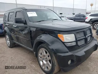 2010 Dodge Nitro SXT z VIN 1D4PT5GK4AW107449, wystawiony jako IAAI lot #41306772 z przebiegiem 174 433 mil mil oraz . Historia ofert i sprzedaży dostępna na DreamBid. Obrazek 1.