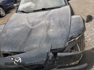 2004 Mazda RX-8 with VIN JM1FE17N140104246, listed as a Copart auction lot 82779204 with Not Provided miles and Salvage Title. Bid and sale history available at carsss.com. Image 12.