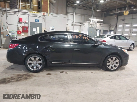 2012 Buick LaCrosse Premium 2 z VIN 1G4GF5E38CF221436, wystawiony jako IAAI lot #41465443 z przebiegiem 191 740 mil mil oraz . Historia ofert i sprzedaży dostępna na DreamBid. Obrazek 13.