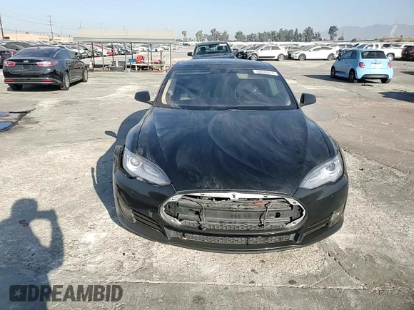 2014 Tesla Model S 60 с VIN 5YJSA1H16EFP40654, выставлен на аукционе Copart как лот 72070974 с пробегом Не указан миль и Списание • Salvage title. История ставок и продаж доступна на DreamBid. Изображение 11.