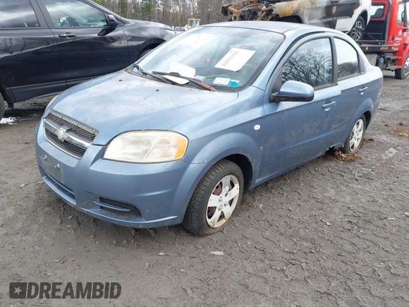2007 Chevrolet Aveo LS with VIN KL1TD56667B175174, listed as a IAAI auction lot 42012342 with 100,534 mi miles and . Bid and sale history available at DreamBid. Image 2.