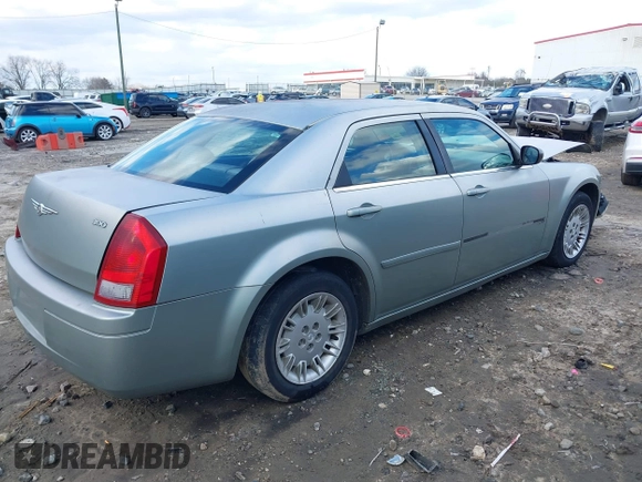 2005 Chrysler 300 with VIN 2C3JA43R05H137403, listed as a IAAI auction lot 41399519 with 135,044 mi miles. Bid and sale history available at carsss.com. Image 4.