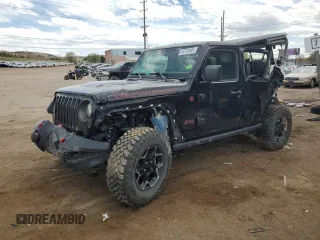 2023 Jeep Wrangler Rubicon with VIN 1C4JJXFM8PW607551, listed as a Copart auction lot 49731885 with 20,227 mi miles and Salvage title. Bid and sale history available at DreamBid. Image 1.