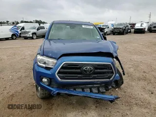 2018 Toyota Tacoma SR5 z VIN 3TMAZ5CN6JM075279, wystawiony jako Copart lot #55894855 z przebiegiem 134 746 mil mil oraz Szkoda całkowita • Salvage title. Historia ofert i sprzedaży dostępna na DreamBid. Obrazek 13.