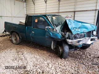 1997 Nissan Frontier XE with VIN 1N6SD16Y2VC338776, listed as a Copart auction lot 45020595 with 243,030 mi miles and Salvage title. Bid and sale history available at DreamBid. Image 4.