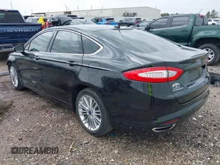 2015 Ford Fusion SE with VIN 3FA6P0H92FR205388, listed as a IAAI auction lot 41699606 with 69,597 mi miles. Bid and sale history available at carsss.com. Image 3.