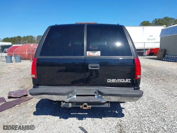 1999 Chevrolet Suburban with VIN 3GNEC16R0XG137834, listed as a IAAI auction lot 41853492 with 296,147 mi miles. Bid and sale history available at carsss.com. Image 16.