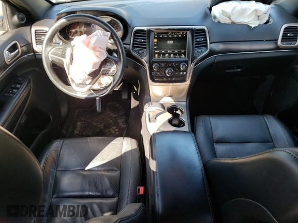 2014 Jeep Grand Cherokee Limited z VIN 1C4RJFBG9EC554421, wystawiony jako Copart lot #53750655 z przebiegiem 211 436 mil mil oraz Szkoda całkowita • Salvage title. Historia ofert i sprzedaży dostępna na DreamBid. Obrazek 8.