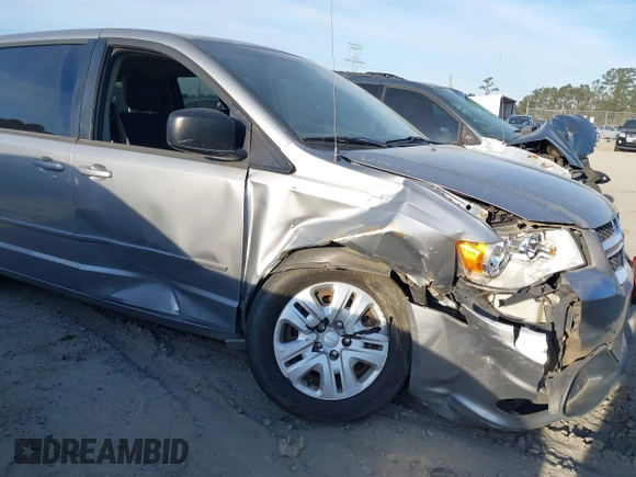 2016 Dodge Grand Caravan SE with VIN 2C4RDGBG5GR314936, listed as a IAAI auction lot 41889795 with 192,621 mi miles and . Bid and sale history available at DreamBid. Image 6.