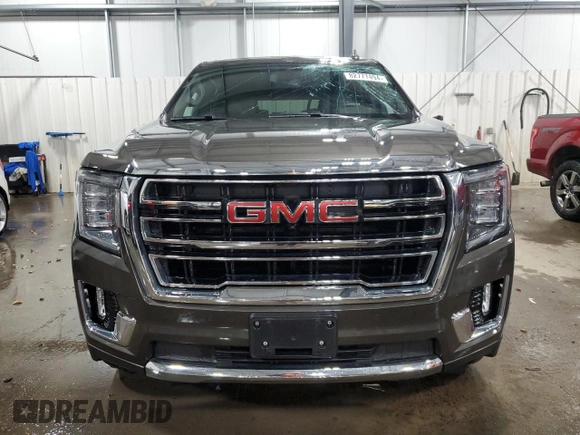2021 GMC Yukon XL SLT with VIN 1GKS2GKD1MR434218, listed as a Copart auction lot 82777494 with 60,601 mi miles and Salvage Title. Bid and sale history available at carsss.com. Image 5.