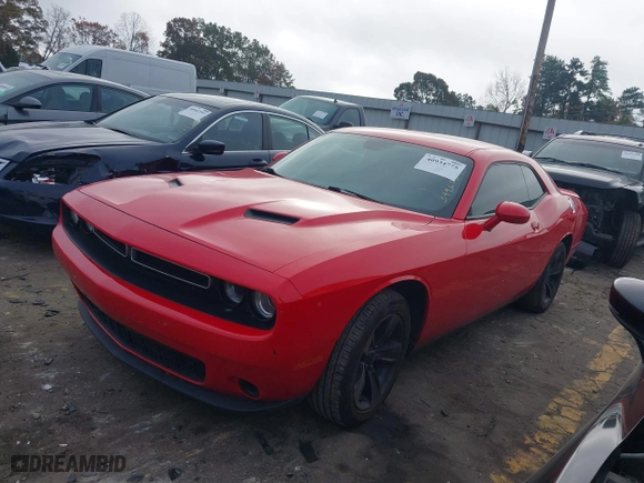 2021 Dodge Challenger SXT with VIN 2C3CDZAG9MH599603, listed as a IAAI auction lot 40934775 with 115,368 mi miles. Bid and sale history available at carsss.com. Image 2.
