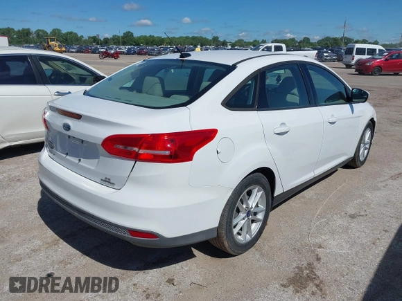 2015 Ford Focus SE with VIN 1FADP3F26FL289857, listed as a IAAI auction lot 42206474 with 111,287 mi miles and . Bid and sale history available at DreamBid. Image 4.