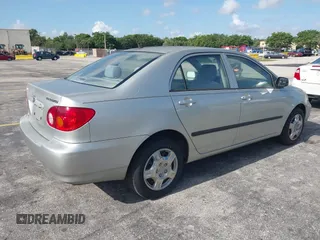 2003 Toyota Corolla CE with VIN JTDBR32E130010551, listed as a IAAI auction lot 42204515 with 129,759 mi miles. Bid and sale history available at carsss.com. Image 4.
