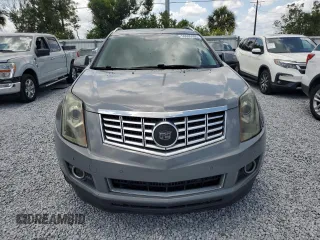 2014 Cadillac SRX Premium Collection z VIN 3GYFNGE30ES627895, wystawiony jako Copart lot #58605985 z przebiegiem 49 300 mil mil oraz Szkoda całkowita • Salvage title. Historia ofert i sprzedaży dostępna na DreamBid. Obrazek 5.