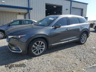 2017 Mazda CX-9 Grand Touring with VIN JM3TCADY0H0130082, listed as a Copart auction lot 56464384 with 115,078 mi miles and Salvage title. Bid and sale history available at DreamBid. Image 1.