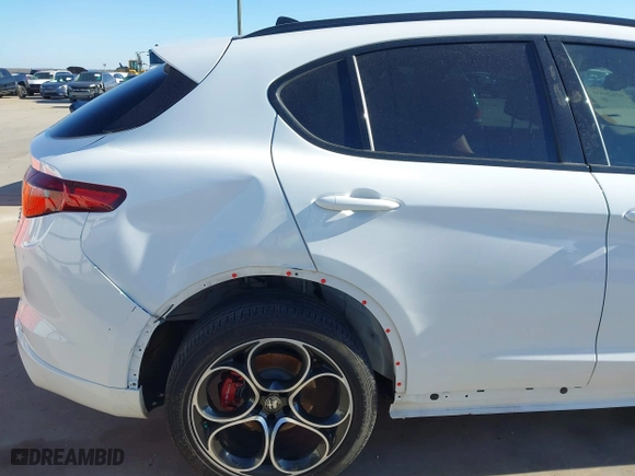 2023 Alfa Romeo Stelvio Ti with VIN ZASPAKBN4P7D63524, listed as a IAAI auction lot 41626631 with 37,731 mi miles. Bid and sale history available at carsss.com. Image 22.