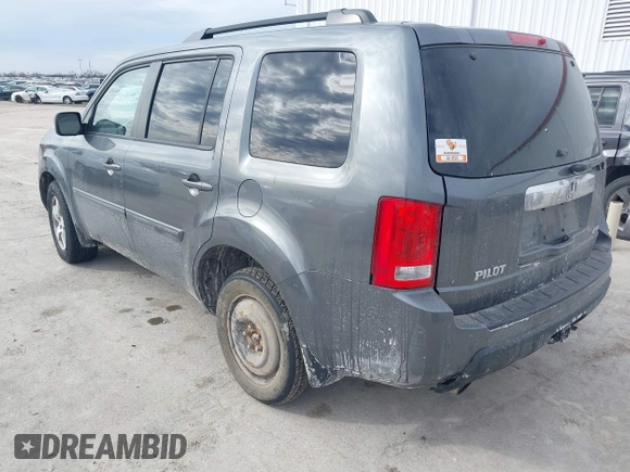 2011 Honda Pilot EX-L with VIN 5FNYF4H59BB042308, listed as a IAAI auction lot 41635511 with 196,736 mi miles and . Bid and sale history available at carsss.com. Image 3.
