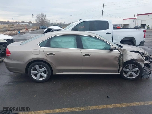 2015 Volkswagen Passat 1.8T Limited Edition with VIN 1VWAS7A30FC089976, listed as a IAAI auction lot 41188354 with 87,950 mi miles. Bid and sale history available at carsss.com. Image 13.
