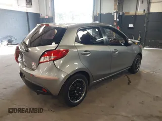 2012 Mazda 2 Sport with VIN JM1DE1KY7C0150803, listed as a IAAI auction lot 41932409 with 89,474 mi miles. Bid and sale history available at carsss.com. Image 4.