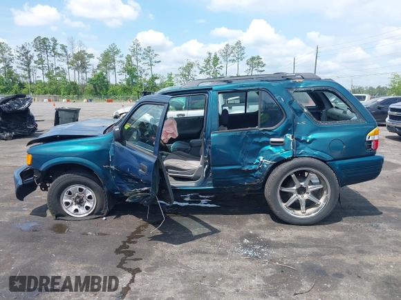 1999 Isuzu Rodeo S with VIN 4S2CK58W6X4332027, listed as a IAAI auction lot 42087396 with 258,508 mi miles and . Bid and sale history available at DreamBid. Image 13.