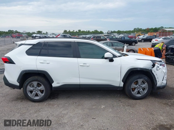 2022 Toyota RAV4 Hybrid XLE z VIN 4T3RWRFV4NU080211, wystawiony jako IAAI lot #42399810 z przebiegiem 101 205 mil mil oraz . Historia ofert i sprzedaży dostępna na DreamBid. Obrazek 13.