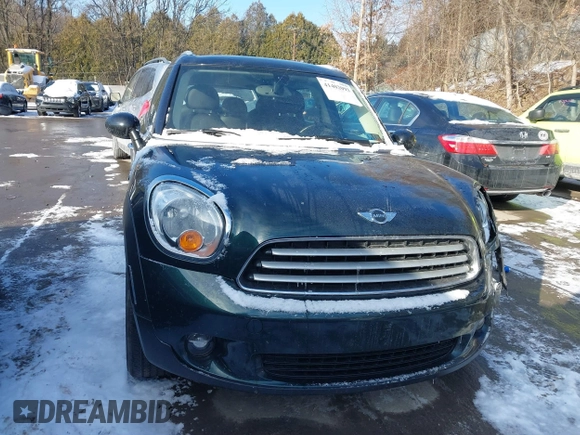 2013 MINI Countryman with VIN WMWZB3C53DWM08700, listed as a IAAI auction lot 41402093 with 71,109 mi miles and . Bid and sale history available at DreamBid. Image 13.