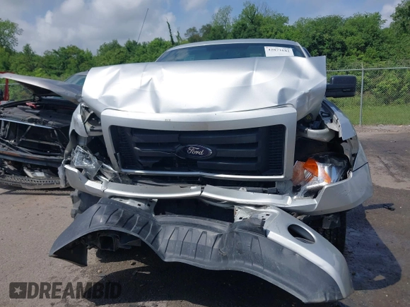2009 Ford F-150 STX z VIN 1FTRX12W59KB81818, wystawiony jako IAAI lot #42073182 z przebiegiem 76 968 mil mil oraz . Historia ofert i sprzedaży dostępna na DreamBid. Obrazek 12.