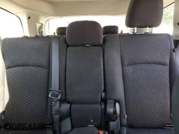 2015 Dodge Journey SE z VIN 3C4PDCAB8FT553477, wystawiony jako Copart lot #58097985 z przebiegiem 145 570 mil mil oraz Szkoda całkowita • Salvage title. Historia ofert i sprzedaży dostępna na DreamBid. Obrazek 10.